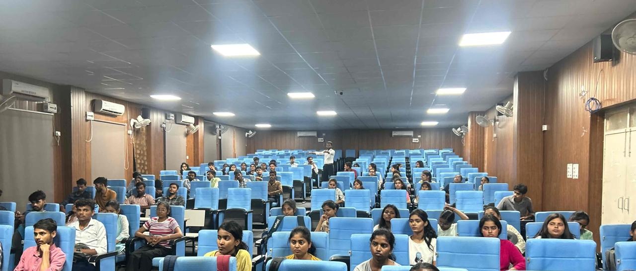 EduInstall campus session — students in auditorium